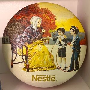 Nestle’s Vintage Bristol Ware Lady & Two Children Tin Canister